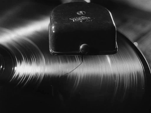 Une image contenant Vinyle, platine, noir et blanc, musique

Le contenu gnr par lIA peut tre incorrect.